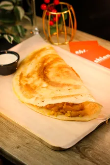 Dosa de patata con salsa de coco